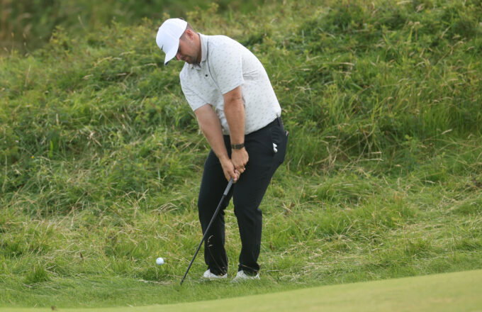 Jul 19, 2025; Portrush, IRL; Chris Gotterup chips on the tenth hole during the third round of The 153rd Open Championship golf tournament. Mandatory Credit: Mike Frey-Imagn Images