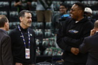 Oct 22, 2025; Boston, Massachusetts, USA; Boston Celtics owner Bill Chisholm, left, talks with CelticsÕ legend Paul Pierce before the game between the Boston Celtics and the Philadelphia 76ers at TD Garden. Mandatory Credit: