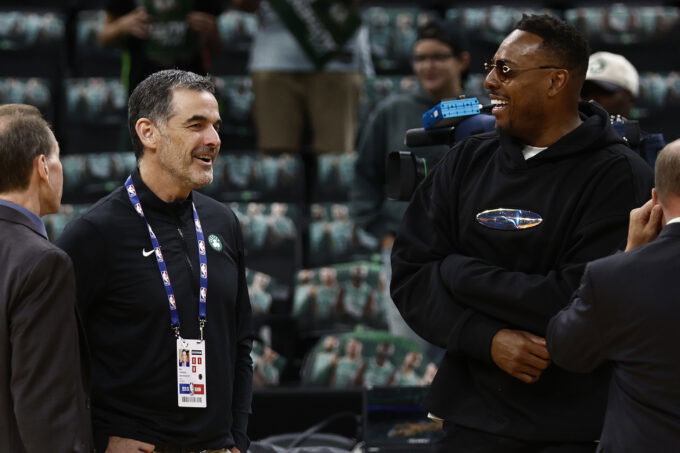 Oct 22, 2025; Boston, Massachusetts, USA; Boston Celtics owner Bill Chisholm, left, talks with CelticsÕ legend Paul Pierce before the game between the Boston Celtics and the Philadelphia 76ers at TD Garden. Mandatory Credit: