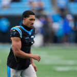 Nov 30, 2025; Charlotte, North Carolina, USA; Carolina Panthers running back Chuba Hubbard (30) looks on before the game against the Los Angeles Rams at Bank of America Stadium. Mandatory Credit: Jim Dedmon-Imagn Images
