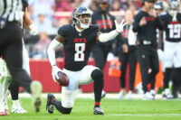Dec 21, 2025; Glendale, Arizona, USA; Atlanta Falcons tight end Kyle Pitts Sr. (8) reacts after making a first down against the Arizona Cardinals during the first half at State Farm Stadium. Mandatory Credit: Mark J. Rebilas-Imagn Images