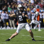 Dec 31, 2025; Tampa, FL, USA; Vanderbilt Commodores quarterback Diego Pavia (2) throws a pass against the Iowa Hawkeyes in the first quarter during the ReliaQuest Bowl at Raymond James Stadium. Mandatory Credit: Nathan Ray Seebeck-Imagn Images