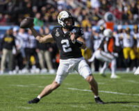 Dec 31, 2025; Tampa, FL, USA; Vanderbilt Commodores quarterback Diego Pavia (2) throws a pass against the Iowa Hawkeyes in the first quarter during the ReliaQuest Bowl at Raymond James Stadium. Mandatory Credit: Nathan Ray Seebeck-Imagn Images