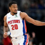 Jan 7, 2026; Detroit, Michigan, USA; Detroit Pistons guard Chaz Lanier (20) reacts after making a three-point basket against the Chicago Bulls in the fourth quarter at Little Caesars Arena. Mandatory Credit: Lon Horwedel-Imagn Images