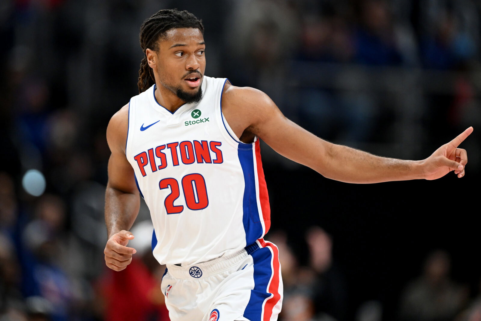 Jan 7, 2026; Detroit, Michigan, USA; Detroit Pistons guard Chaz Lanier (20) reacts after making a three-point basket against the Chicago Bulls in the fourth quarter at Little Caesars Arena. Mandatory Credit: Lon Horwedel-Imagn Images