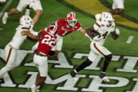 Jan 19, 2026; Miami Gardens, FL, USA; Miami Hurricanes running back Mark Fletcher Jr. (4) carries the ball for a touchdown against the Indiana Hoosiers in the third quarter during the College Football Playoff National Championship game at Hard Rock Stadium. Mandatory Credit: Kim Klement Neitzel-Imagn Images