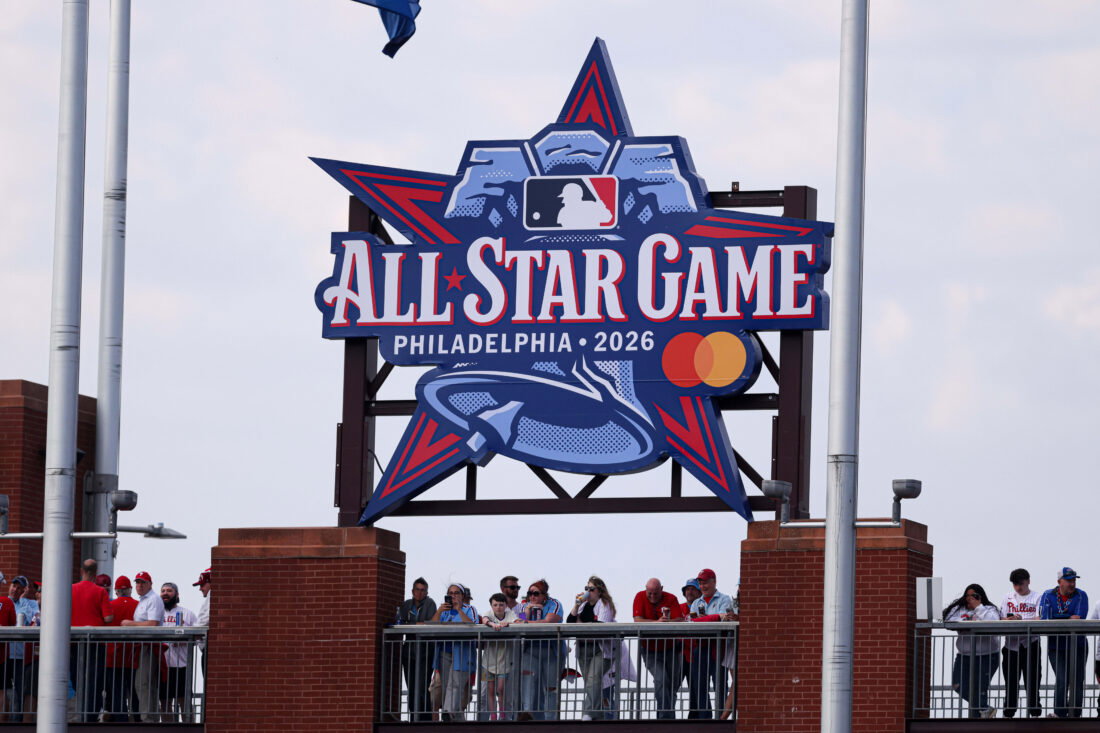 Mar 26, 2026; Philadelphia, Pennsylvania, USA; Fans stand under a 2026 All Star Game sign during a game between the Philadelphia Phillies and the Texas Rangers at Citizens Bank Park. Mandatory Credit: Bill Streicher-Imagn Images