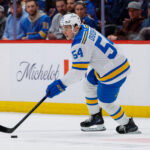 Apr 5, 2026; Denver, Colorado, USA; St. Louis Blues right wing Dalibor Dvorsky (54) controls the puck in the first period against the Colorado Avalanche at Ball Arena. Mandatory Credit: Isaiah J. Downing-Imagn Images