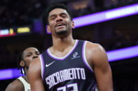 Apr 7, 2026; San Francisco, California, USA; Sacramento Kings center Dylan Cardwell (32) smiles after getting called for a foul against the Golden State Warriors in the fourth quarter at Chase Center. Mandatory Credit: David Gonzales-Imagn Images