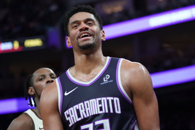 Apr 7, 2026; San Francisco, California, USA; Sacramento Kings center Dylan Cardwell (32) smiles after getting called for a foul against the Golden State Warriors in the fourth quarter at Chase Center. Mandatory Credit: David Gonzales-Imagn Images