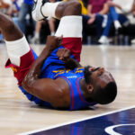 Apr 20, 2026; Denver, Colorado, USA; Denver Nuggets guard Tim Hardaway Jr. (10) reacts to a charging foul called on Minnesota Timberwolves in the first half during game two of the first round of the 2026 NBA Playoffs at Ball Arena. Mandatory Credit: Ron Chenoy-Imagn Images