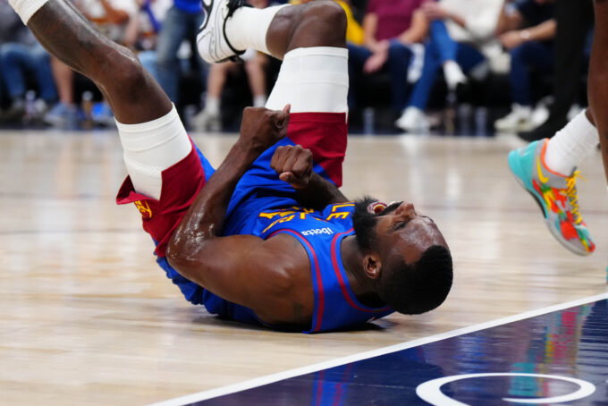 Apr 20, 2026; Denver, Colorado, USA; Denver Nuggets guard Tim Hardaway Jr. (10) reacts to a charging foul called on Minnesota Timberwolves in the first half during game two of the first round of the 2026 NBA Playoffs at Ball Arena. Mandatory Credit: Ron Chenoy-Imagn Images