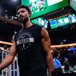 Apr 28, 2026; Boston, Massachusetts, USA; Philadelphia 76ers guard Quentin Grimes (5) comes off the court after warming up before the start of the game against the Boston Celtics during game five of the first round of the 2026 NBA Playoffs at TD Garden. Mandatory Credit: David Butler II-Imagn Images