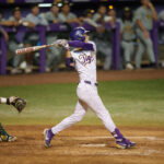 Apr 28, 2026; Baton Rouge, LA, USA; Louisiana State Tigers outfielder Derek Curiel (6) bats against the Southeastern Louisiana Lions at Alex Box Stadium. Mandatory Credit: Matthew Hinton-Imagn Images
