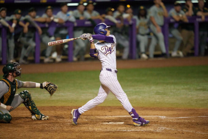Apr 28, 2026; Baton Rouge, LA, USA; Louisiana State Tigers outfielder Derek Curiel (6) bats against the Southeastern Louisiana Lions at Alex Box Stadium. Mandatory Credit: Matthew Hinton-Imagn Images