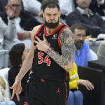 Apr 29, 2026; Cleveland, Ohio, USA; Toronto Raptors forward Sandro Mamukelashvili (54) celebrates his three-point basket against the Cleveland Cavaliers in the third quarter of game five of the first round of the 2026 NBA Playoffs at Rocket Arena. Mandatory Credit: David Richard-Imagn Images