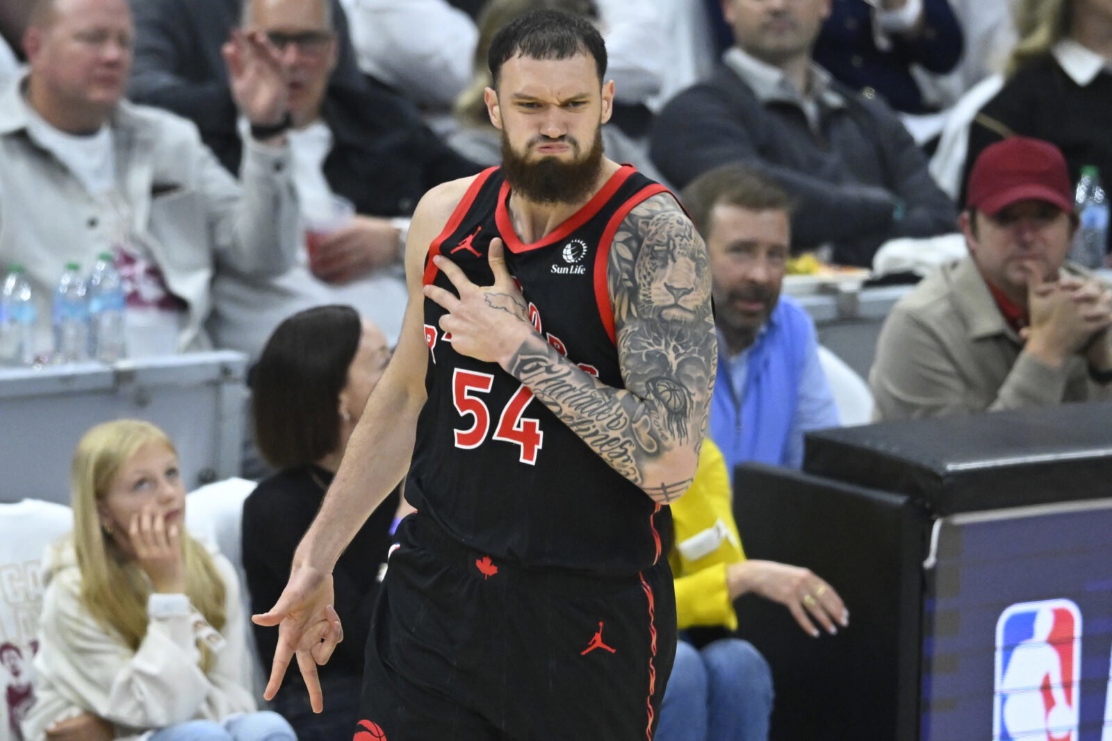 Apr 29, 2026; Cleveland, Ohio, USA; Toronto Raptors forward Sandro Mamukelashvili (54) celebrates his three-point basket against the Cleveland Cavaliers in the third quarter of game five of the first round of the 2026 NBA Playoffs at Rocket Arena. Mandatory Credit: David Richard-Imagn Images