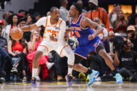 Apr 30, 2026; Atlanta, Georgia, USA; Atlanta Hawks forward Jonathan Kuminga (0) is defended by New York Knicks forward Og Anunoby (8) in the second quarter during game six of the first round of the 2026 NBA Playoffs at State Farm Arena. Mandatory Credit: Brett Davis-Imagn Images