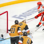 May 6, 2026; Las Vegas, Nevada, USA; Anaheim Ducks center Leo Carlsson (91) scores a goal against Vegas Golden Knights goaltender Carter Hart (79) during the third period of game two of the second round of the 2026 Stanley Cup Playoffs at T-Mobile Arena. Mandatory Credit: Stephen R. Sylvanie-Imagn Images