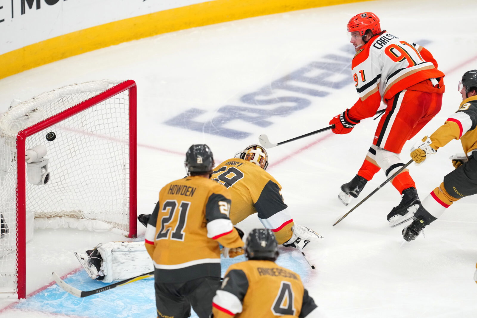 May 6, 2026; Las Vegas, Nevada, USA; Anaheim Ducks center Leo Carlsson (91) scores a goal against Vegas Golden Knights goaltender Carter Hart (79) during the third period of game two of the second round of the 2026 Stanley Cup Playoffs at T-Mobile Arena. Mandatory Credit: Stephen R. Sylvanie-Imagn Images