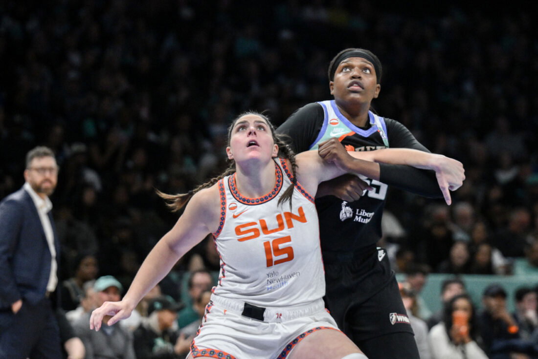 May 8, 2026; Brooklyn, New York, USA; Connecticut Sun center Raegan Beers (15) boxes out New York Liberty center Jonquel Jones (35) during the first half at Barclays Center. Mandatory Credit: John Jones-Imagn Images