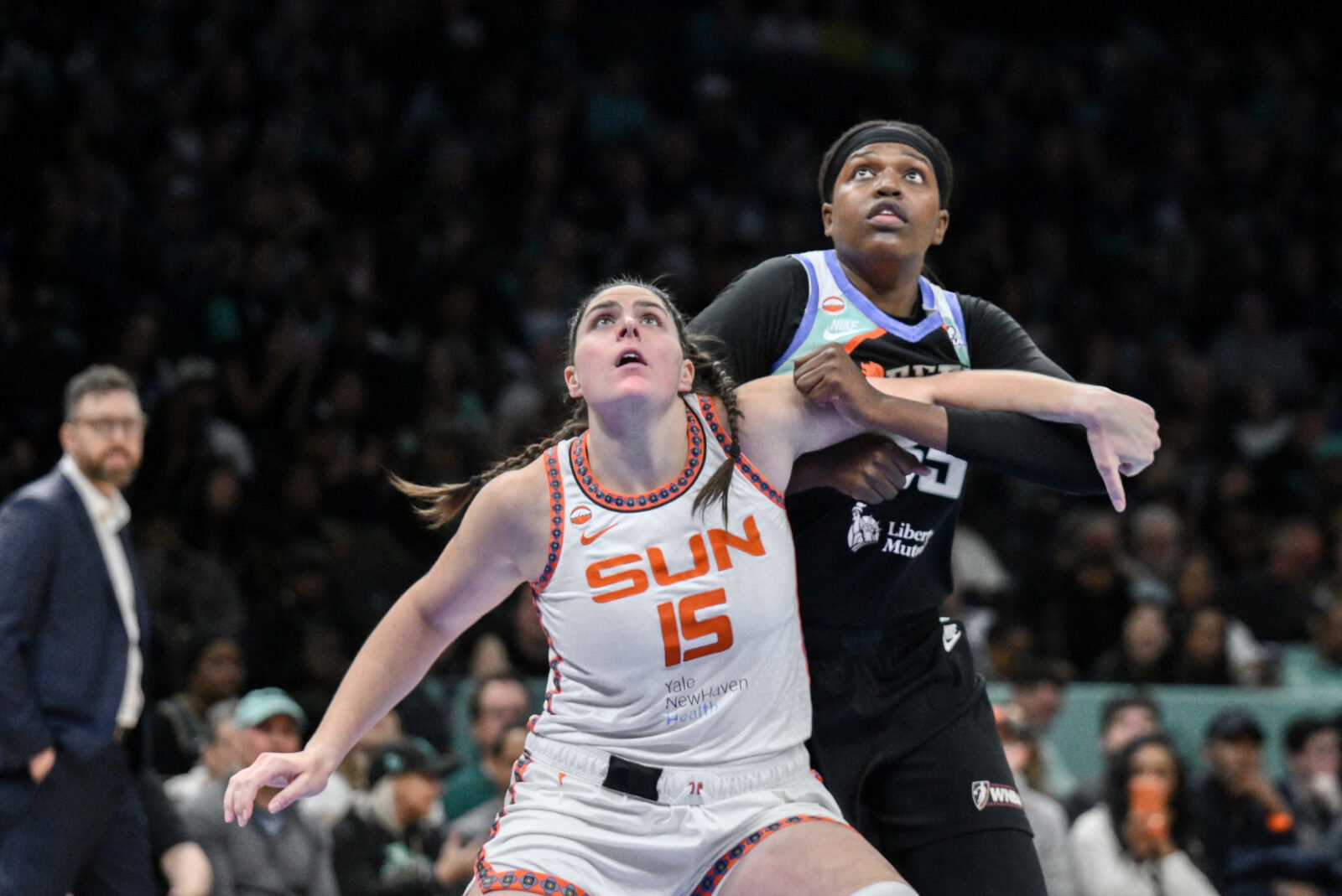 May 8, 2026; Brooklyn, New York, USA; Connecticut Sun center Raegan Beers (15) boxes out New York Liberty center Jonquel Jones (35) during the first half at Barclays Center. Mandatory Credit: John Jones-Imagn Images