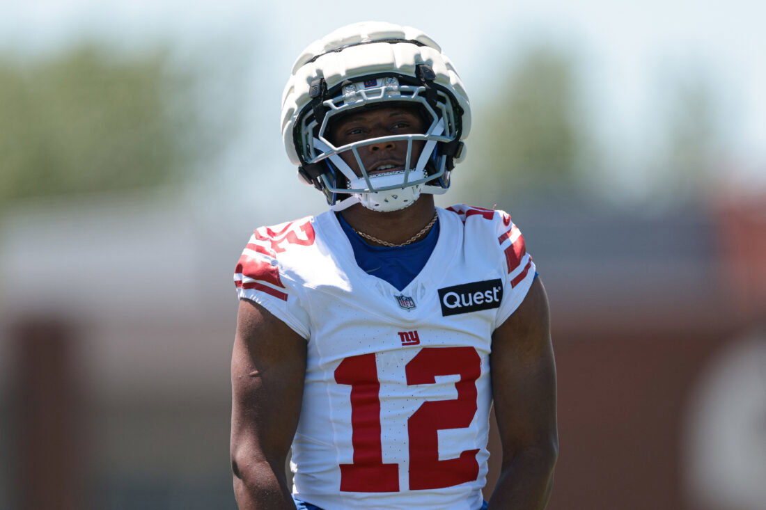 Jun 3, 2026; East Rutherford, NJ, USA; New York Giants cornerback Colton Hood (12) participates in drills during organized team activities at Quest Diagnostics Training Center. Mandatory Credit: Vincent Carchietta-Imagn Images