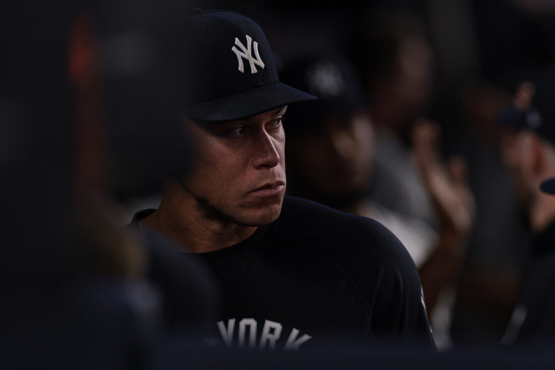 Jun 5, 2026; Bronx, New York, USA; New York Yankees right fielder Aaron Judge (99) looks out from the dugout during the eighth inning against the Boston Red Sox at Yankee Stadium. Mandatory Credit: Vincent Carchietta-Imagn Images