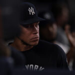 Jun 5, 2026; Bronx, New York, USA; New York Yankees right fielder Aaron Judge (99) looks out from the dugout during the eighth inning against the Boston Red Sox at Yankee Stadium. Mandatory Credit: Vincent Carchietta-Imagn Images