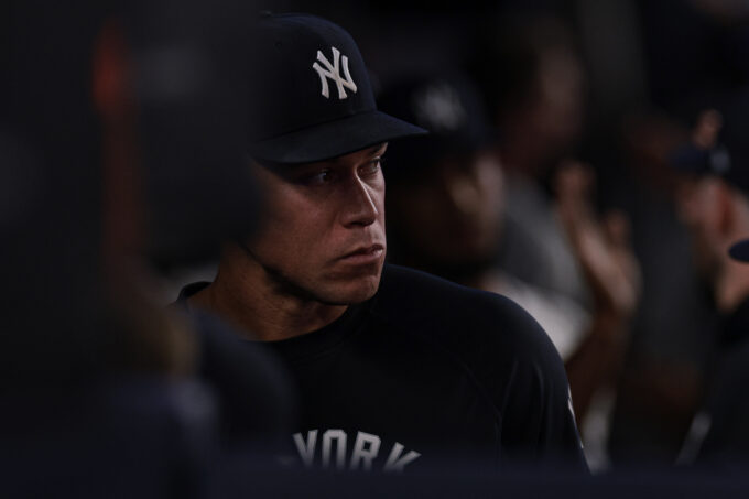 Jun 5, 2026; Bronx, New York, USA; New York Yankees right fielder Aaron Judge (99) looks out from the dugout during the eighth inning against the Boston Red Sox at Yankee Stadium. Mandatory Credit: Vincent Carchietta-Imagn Images