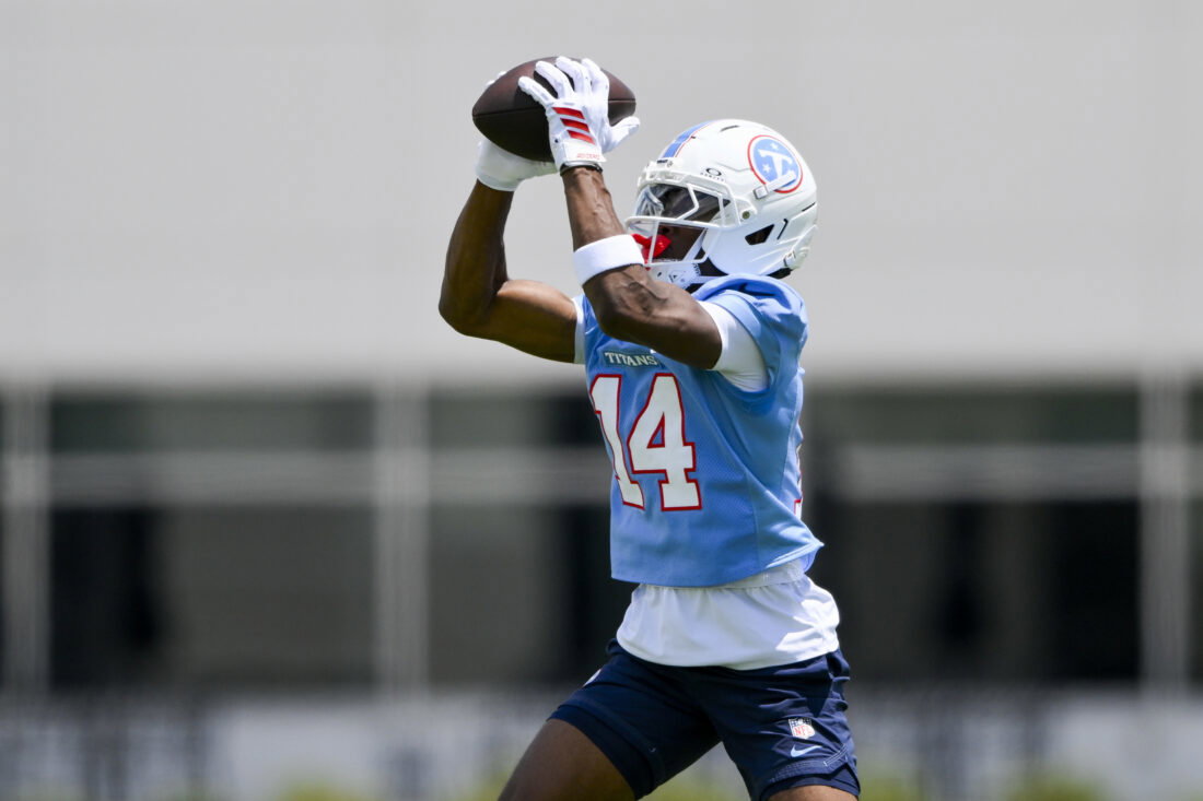 Jun 16, 2026; Nashville, TN, USA; Tennessee Titans wider receiver Carnell Tate (14) makes a catch during day 1 of mini-camp at Vanderbilt Health Football Center. Mandatory Credit: Steve Roberts-Imagn Images