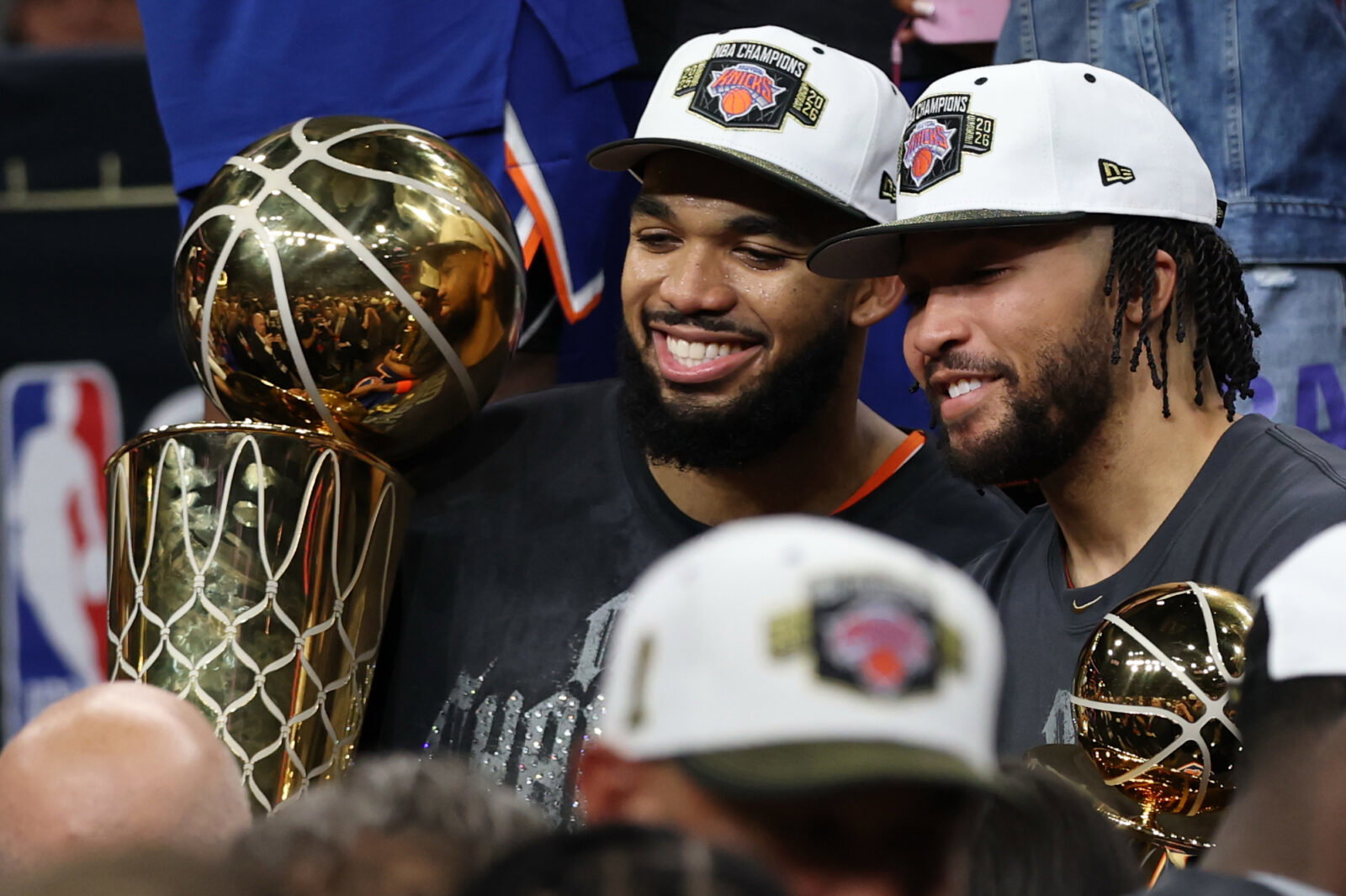 Jun 13, 2026; San Antonio, Texas, USA; New York Knicks center Karl-Anthony Towns (32) and Knicks guard Jalen Brunson (11) pose with the Larry O'Brien and Finals MVP trophies, respectively, during the championship trophy ceremony after game five of the 2026 NBA Finals against the San Antonio Spurs at Frost Bank Center. Mandatory Credit: Geoff Burke-Imagn Images
