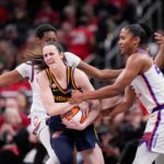 Phoenix Mercury forward Alyssa Thomas (25) attempts to strip the ball from Indiana Fever guard Caitlin Clark (22) on Monday, June 22, 2026, during the game at Gainbridge Fieldhouse in Indianapolis. The Indiana Fever defeated the Phoenix Mercury, 86-77. Credit: Grace Hollars/IndyStar / USA TODAY NETWORK via Imagn Images