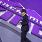 Jun 23, 2026; New York, NY, USA; The seventh pick in the 2026 NBA draft, Arkansas guard Darius Acuff Jr. after he was selected by the Sacramento Kings at Barclays Center. Mandatory Credit: Brad Penner-Imagn Images
