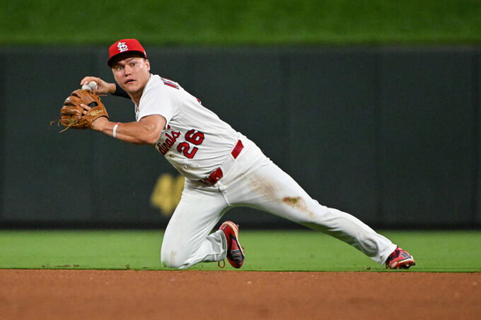 Jun 24, 2026; St. Louis, Missouri, USA; St. Louis Cardinals second baseman JJ Wetherholt (26) throws from his knees against the Arizona Diamondbacks during the seventh inning at Busch Stadium. Mandatory Credit: Jeff Curry-Imagn Images