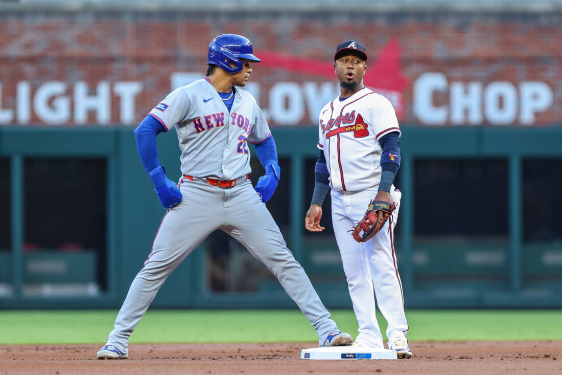 Jul 6, 2026; Cumberland, Georgia, USA; New York Mets left fielder Juan Soto (22) steals second base against Atlanta Braves second baseman Ozzie Albies (1) during the first inning at Truist Park. Mandatory Credit: Jordan Godfree-Imagn Images