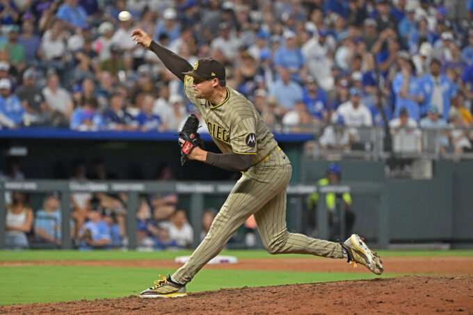 Jul 17, 2026; Kansas City, Missouri, USA; San Diego Padres relief pitcher Mason Miller (22) throws a pitch in the ninth inning against the Kansas City Royals at Kauffman Stadium. Mandatory Credit: Peter Aiken-Imagn Images