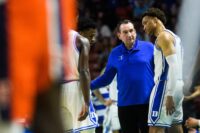 Duke University Head Coach Mike Kryzewski speaks with his players during their game against California State Fullerton during the NCAA Men's Division I Basketball Tournament at the Bon Secours Wellness Arena Friday, March 18, 2022.