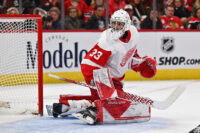 Oct 1, 2022; Chicago, Illinois, USA; Detroit Red Wings goaltender Sebastian Cossa (33) defends the net against the Chicago Blackhawks at United Center. Mandatory Credit: Jamie Sabau-USA TODAY Sports