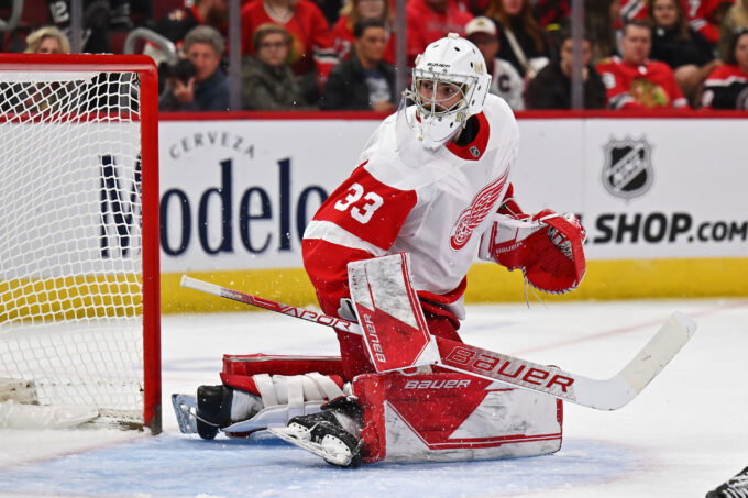 Oct 1, 2022; Chicago, Illinois, USA; Detroit Red Wings goaltender Sebastian Cossa (33) defends the net against the Chicago Blackhawks at United Center. Mandatory Credit: Jamie Sabau-USA TODAY Sports