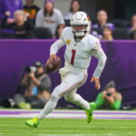 Dec 1, 2024; Minneapolis, Minnesota, USA; Arizona Cardinals quarterback Kyler Murray (1) scrambles against the Minnesota Vikings in the second quarter at U.S. Bank Stadium. Mandatory Credit:
