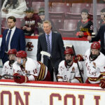 Feb 28, 2025; Chestnut Hill, MA, USA; Boston College Eagles head coach Greg Brown (center) looks on during the third period against the University of New Hampshire Wildcats at Conte Forum. Mandatory Credit: Eric Canha-Imagn Images