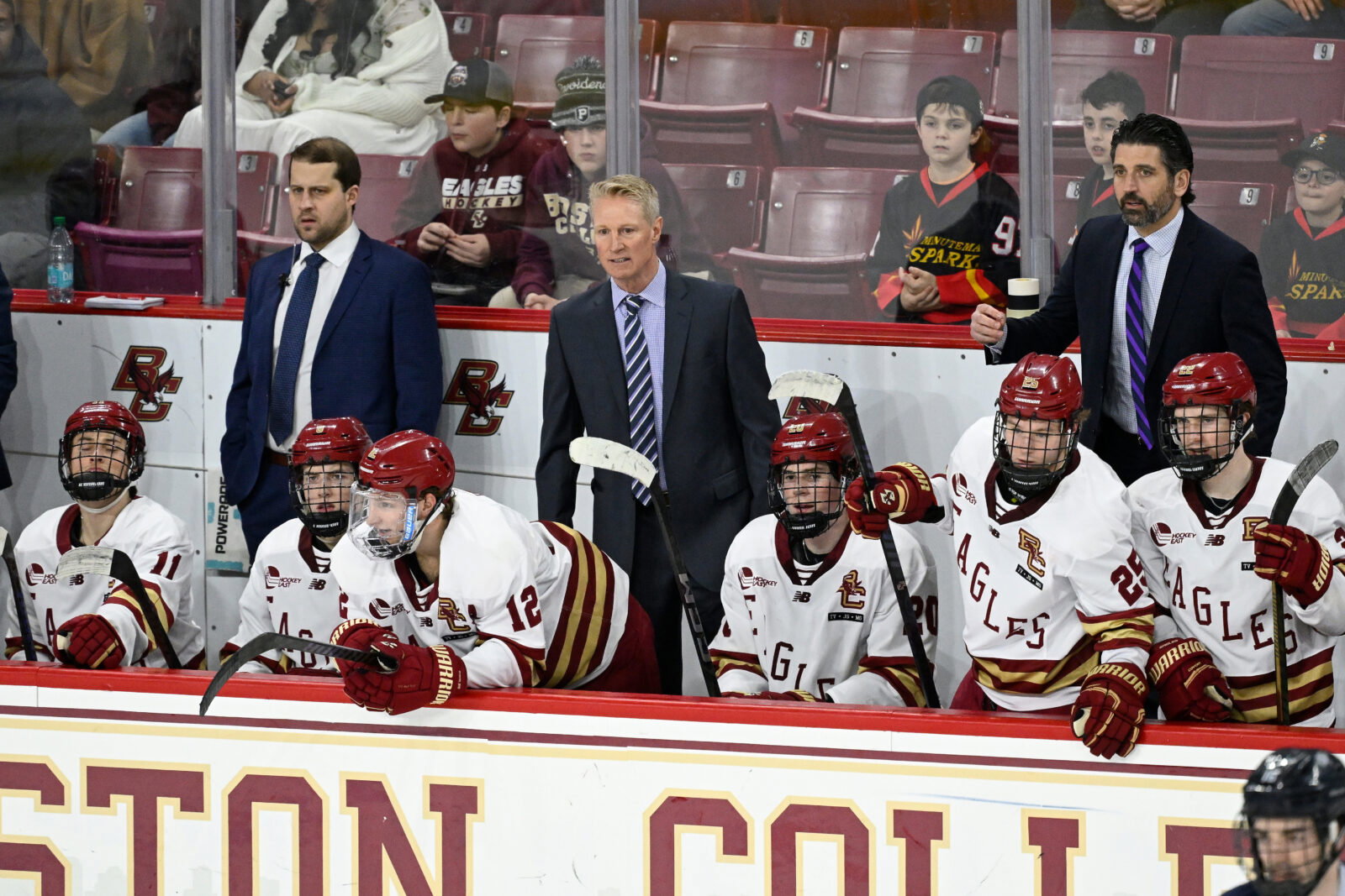 Feb 28, 2025; Chestnut Hill, MA, USA; Boston College Eagles head coach Greg Brown (center) looks on during the third period against the University of New Hampshire Wildcats at Conte Forum. Mandatory Credit: Eric Canha-Imagn Images