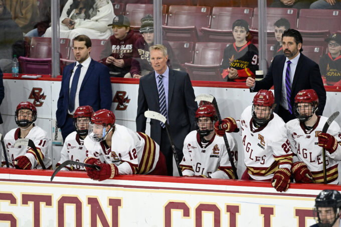 Feb 28, 2025; Chestnut Hill, MA, USA; Boston College Eagles head coach Greg Brown (center) looks on during the third period against the University of New Hampshire Wildcats at Conte Forum. Mandatory Credit: Eric Canha-Imagn Images