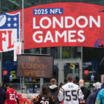 Oct 12, 2025; Tottenham, United Kingdom; Fans arrive before an NFL International Series game at Tottenham Hotspur Stadium. Mandatory Credit: Kirby Lee-Imagn Images