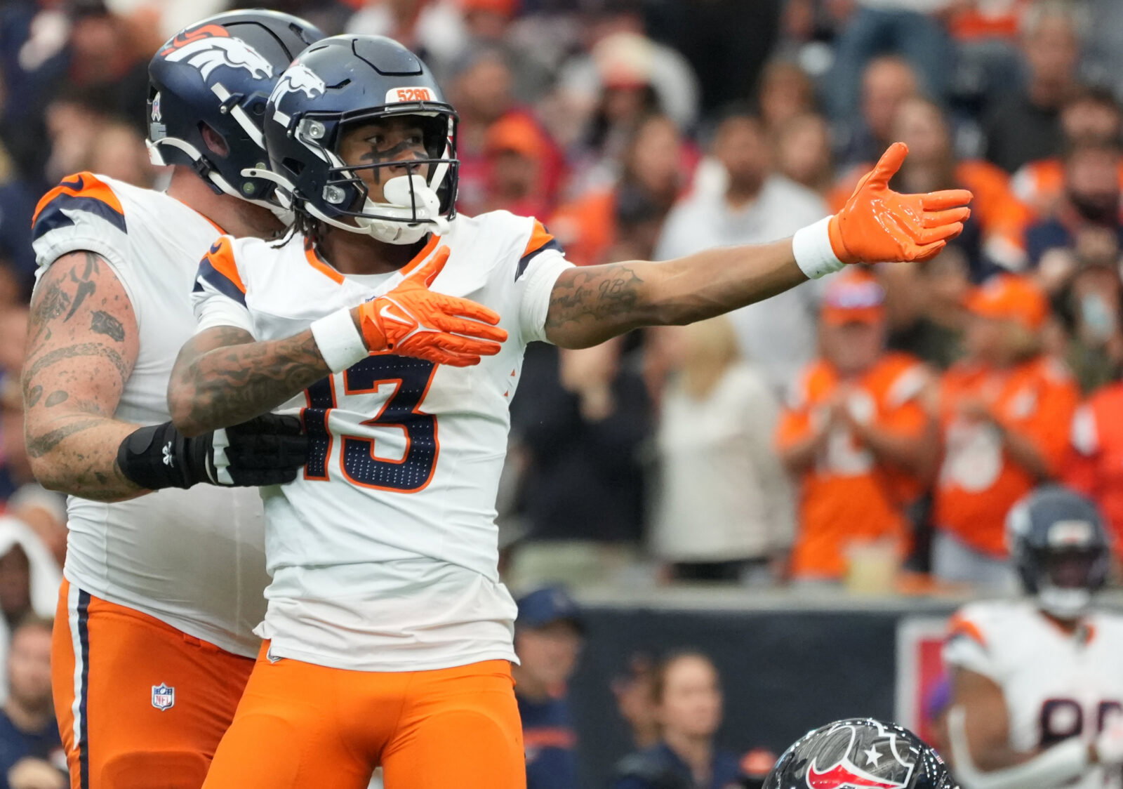 Nov 2, 2025; Houston, Texas, USA; Denver Broncos wide receiver Pat Bryant (13) celebrates after a first down during the second half against the Houston Texans at NRG Stadium. Mandatory Credit: Sean Thomas-Imagn Images