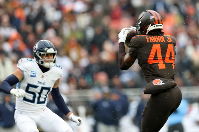 Dec 7, 2025; Cleveland, Ohio, USA; Cleveland Browns tight end Harold Fannin Jr. (44) catches a pass for a first down against Tennessee Titans linebacker Cody Barton (50) during the first quarter at Huntington Bank Field. Mandatory Credit: Scott Galvin-Imagn Images