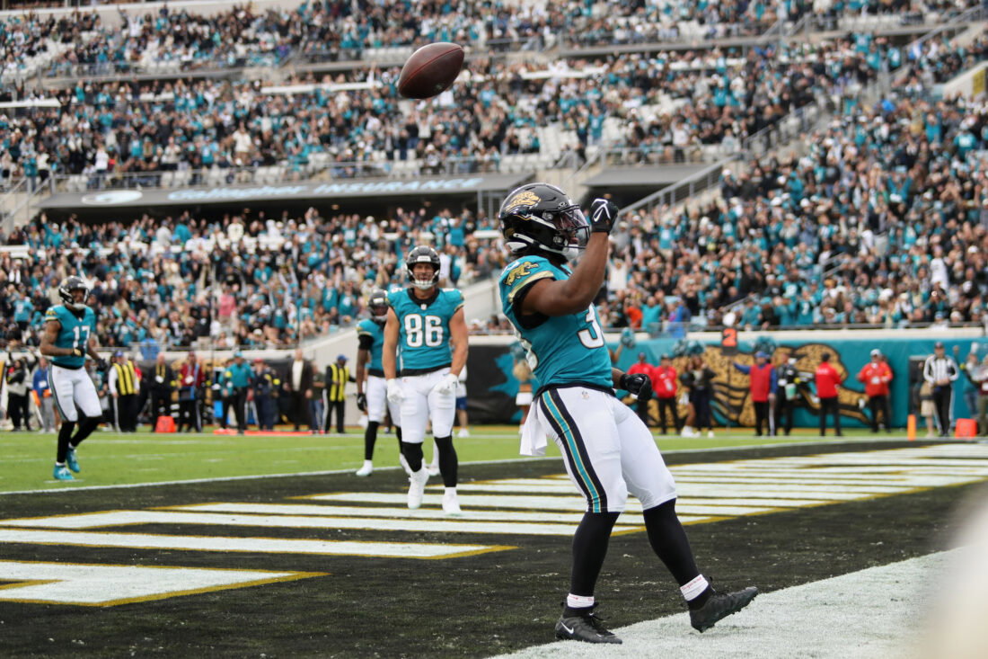 Jan 4, 2026; Jacksonville, Florida, USA; Jacksonville Jaguars running back Bhayshul Tuten (33) celebrates after scoring a rushing touchdown against the Tennessee Titans during the fourth quarter at EverBank Stadium. Mandatory Credit: Morgan Tencza-Imagn Images