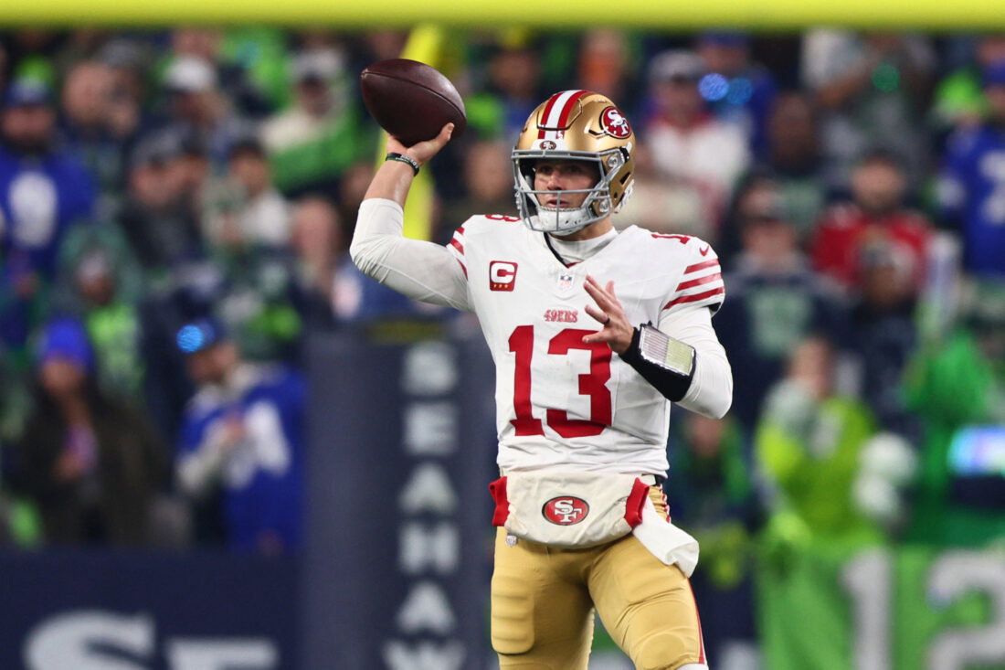 Jan 17, 2026; Seattle, WA, USA; San Francisco 49ers quarterback Brock Purdy (13) throws downfield against the Seattle Seahawks during the first half in an NFC Divisional Round game at Lumen Field. Mandatory Credit: Kevin Ng-Imagn Images