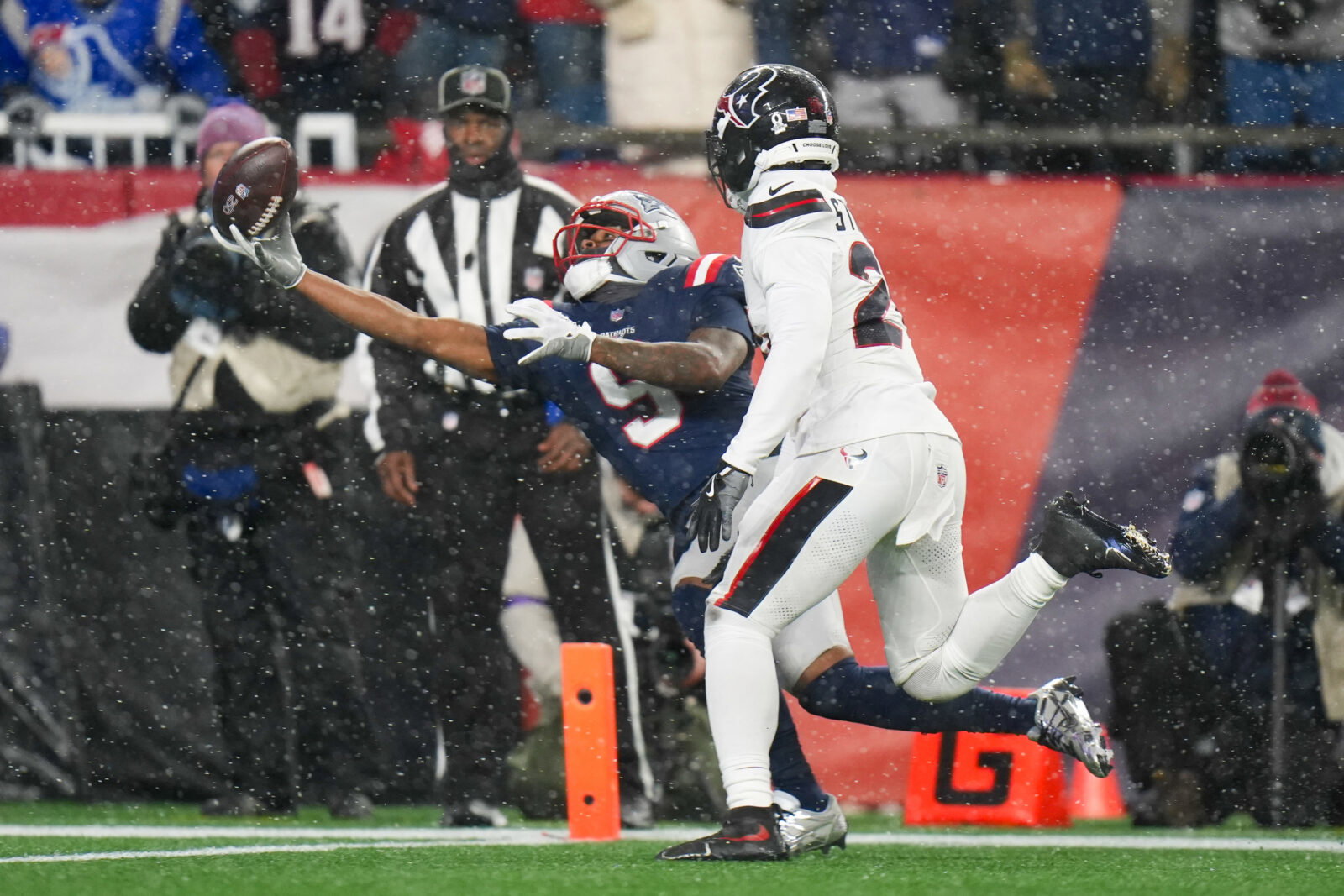 Jan 18, 2026; Foxborough, MA, USA; England Patriots wide receiver Kayshon Boutte (9) catches the ball for a touchdown in the fourth quarter against the Houston Texans in an AFC Divisional Round game at Gillette Stadium. Mandatory Credit:
